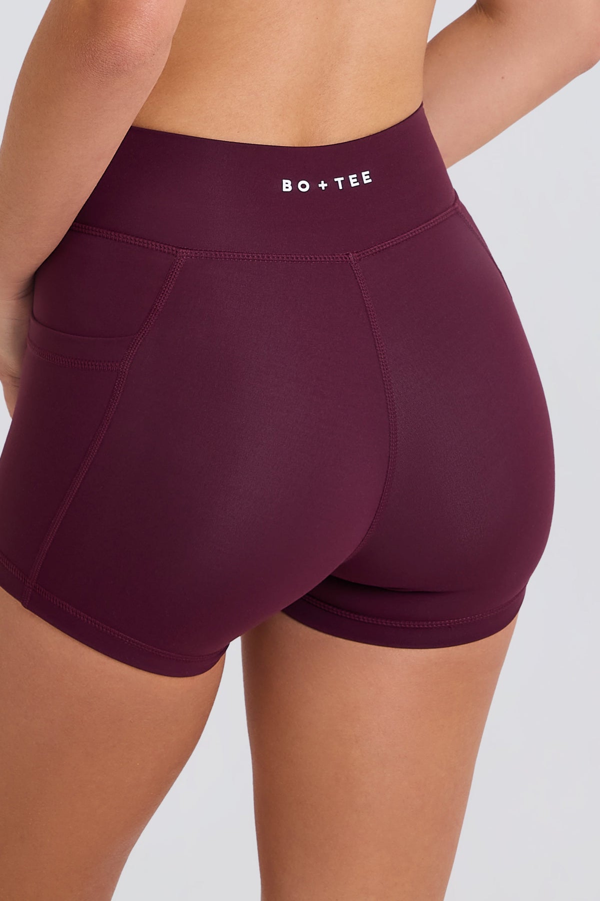 Soft Active V-Waist Pocket Mini Shorts in Burgundy