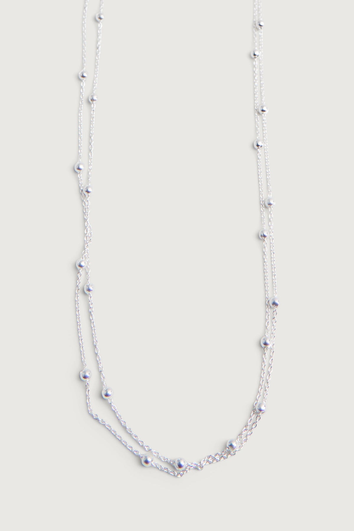 LAYERED BEADED NECKLACE