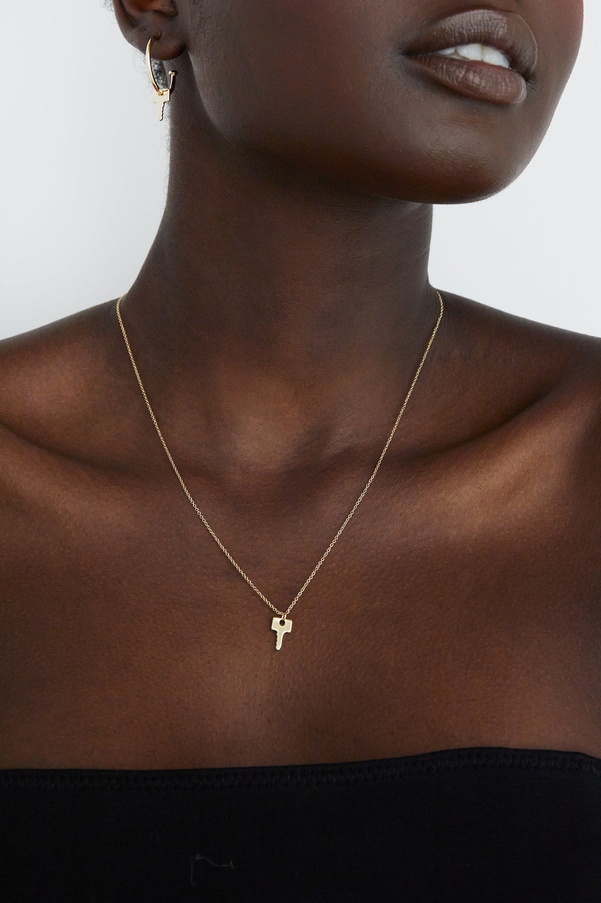 KEY CHARM NECKLACE