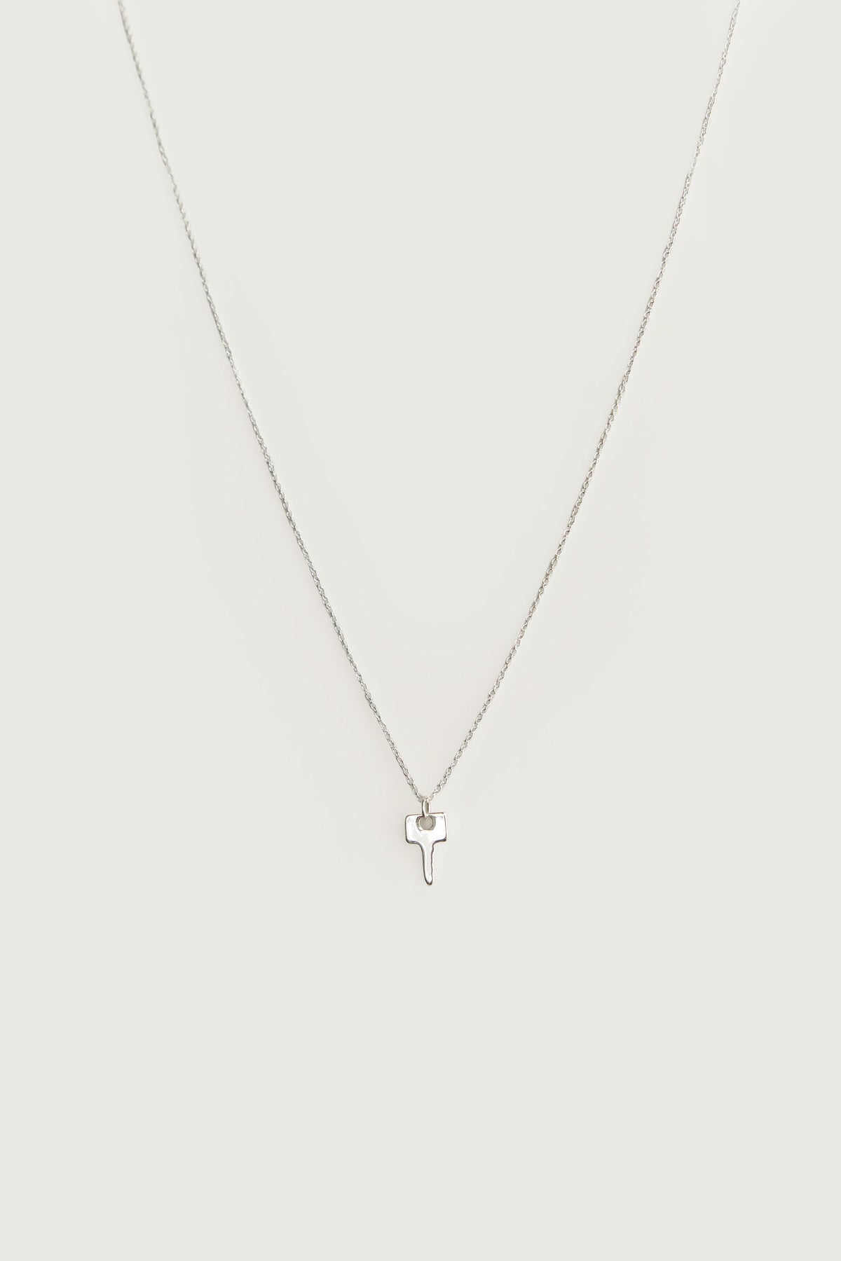 KEY CHARM NECKLACE