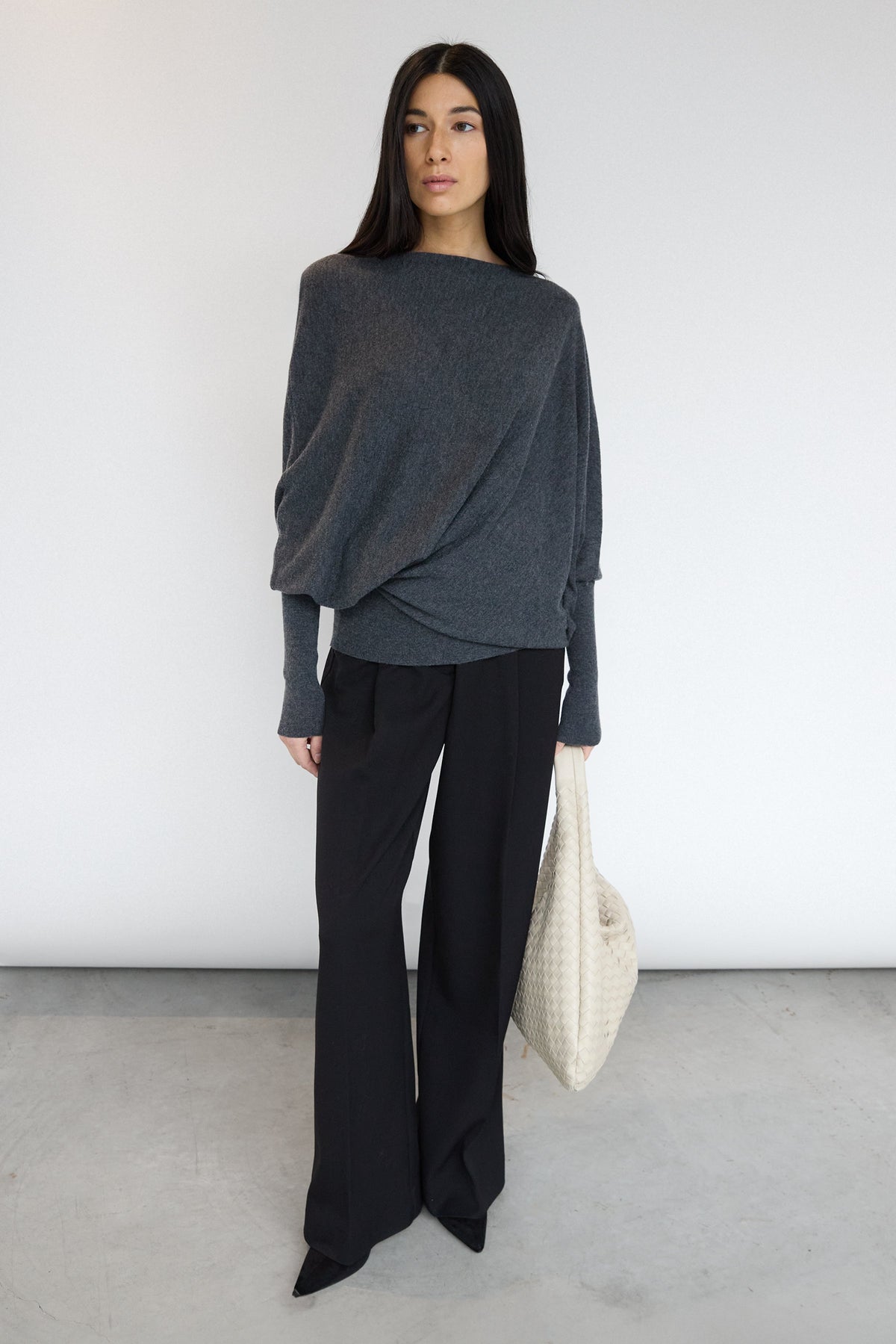 ASYMMETRICAL SWEATER WITH CUFFED SLEEVE