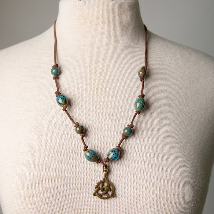 Jennifer's Unisex Leather and Ceramic Trinity Knot Necklace