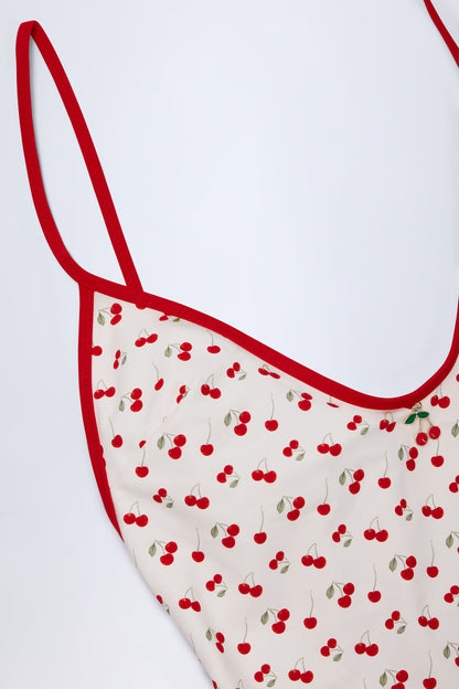 Charm-Detail Cross-Back Swimsuit in Cherry Print
