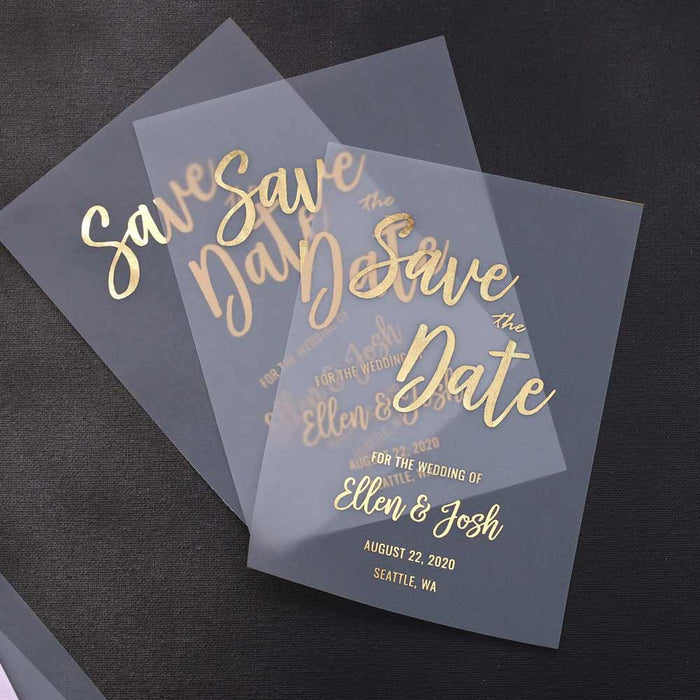 XOXOKristen translucent vellum Save the Date card printed in metallic gold foil, standing upright against soft background with dried floral decor and natural light – XOXOKristen.